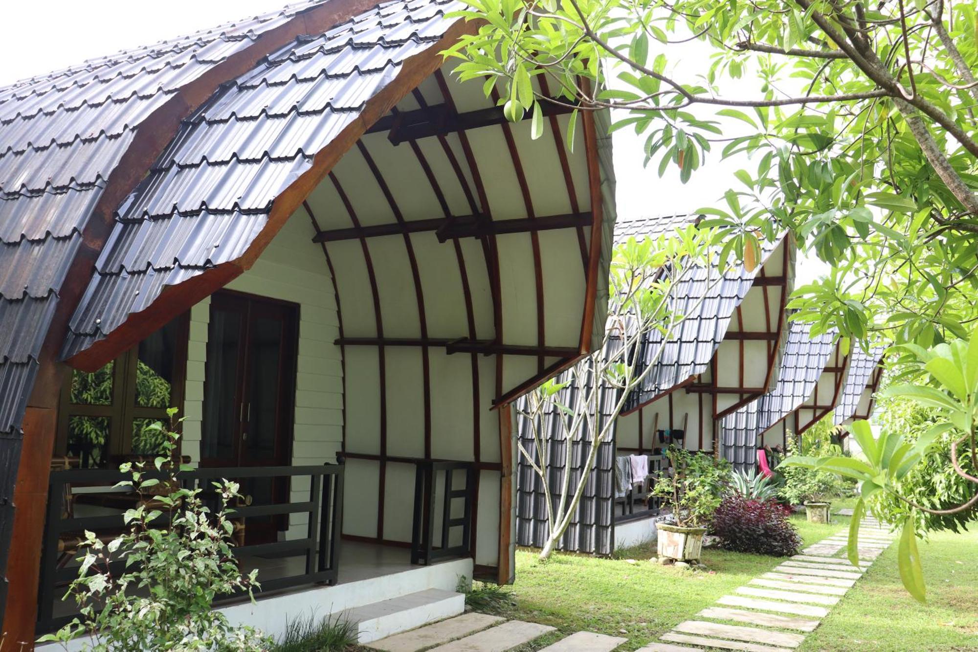 Gino'S Place - Guest House & Jungle Trekking Bukit Lawang Exterior photo